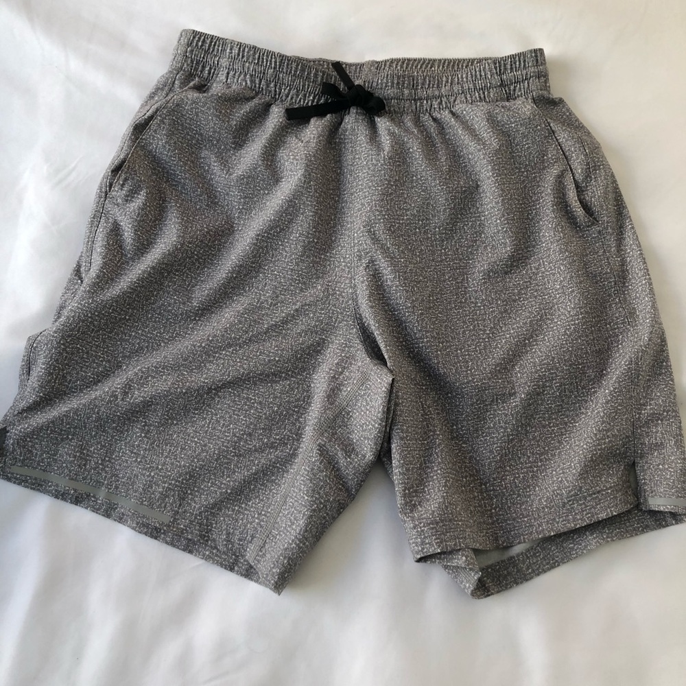 Light grey men’s athletic shorts, 7in inseam
